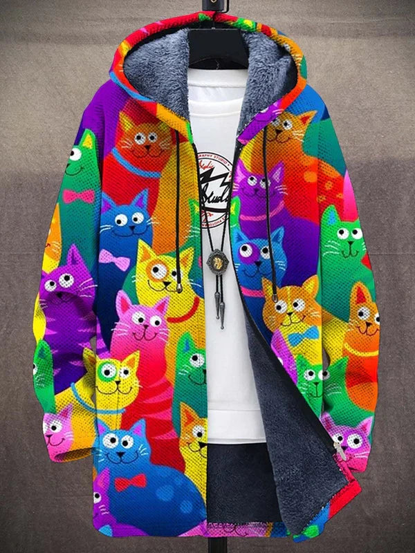 Women's hooded jacket covered in colourful cartoon cats, worn open over a white tee