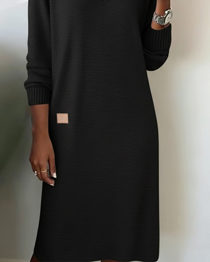 Black knitted midi dress from the side