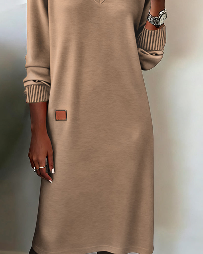Camel knitted dress from the side with a straight hem