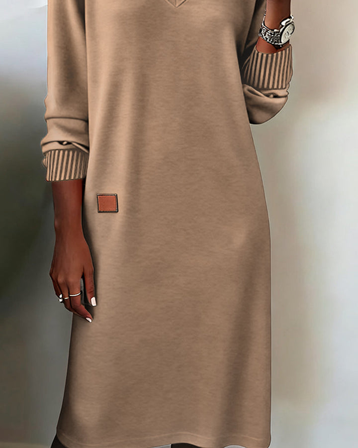 Camel knitted dress from the side with a straight hem