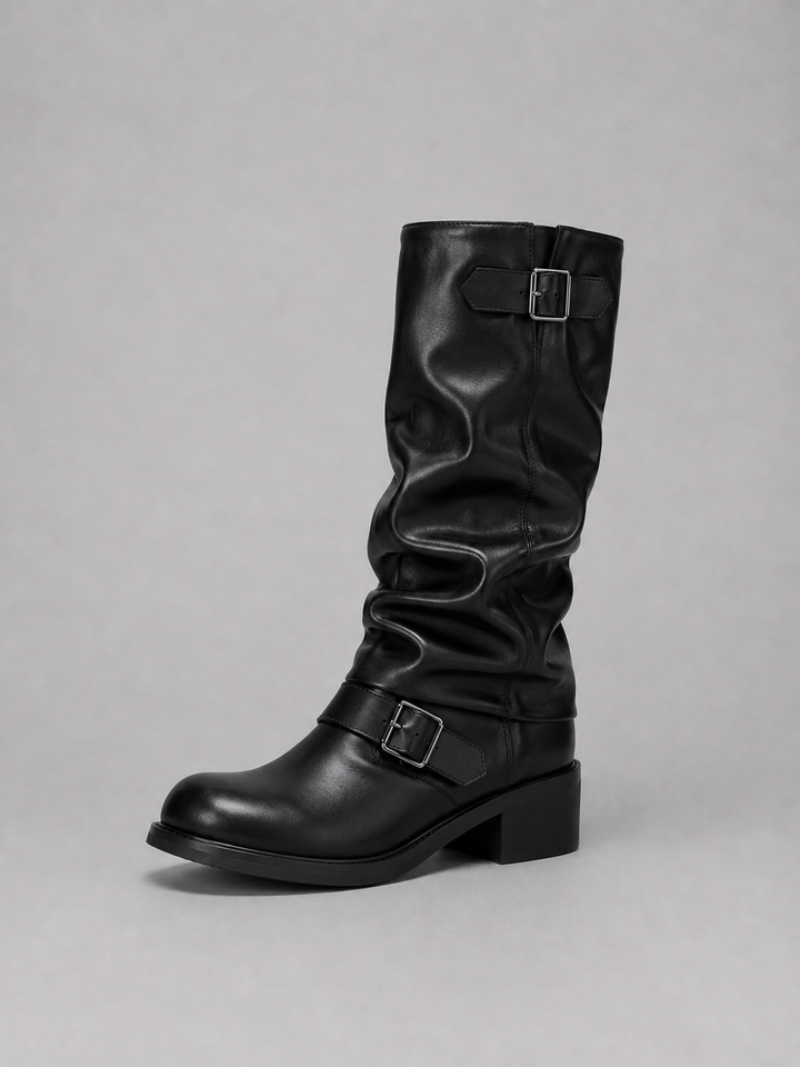Side view of the black knee high boots