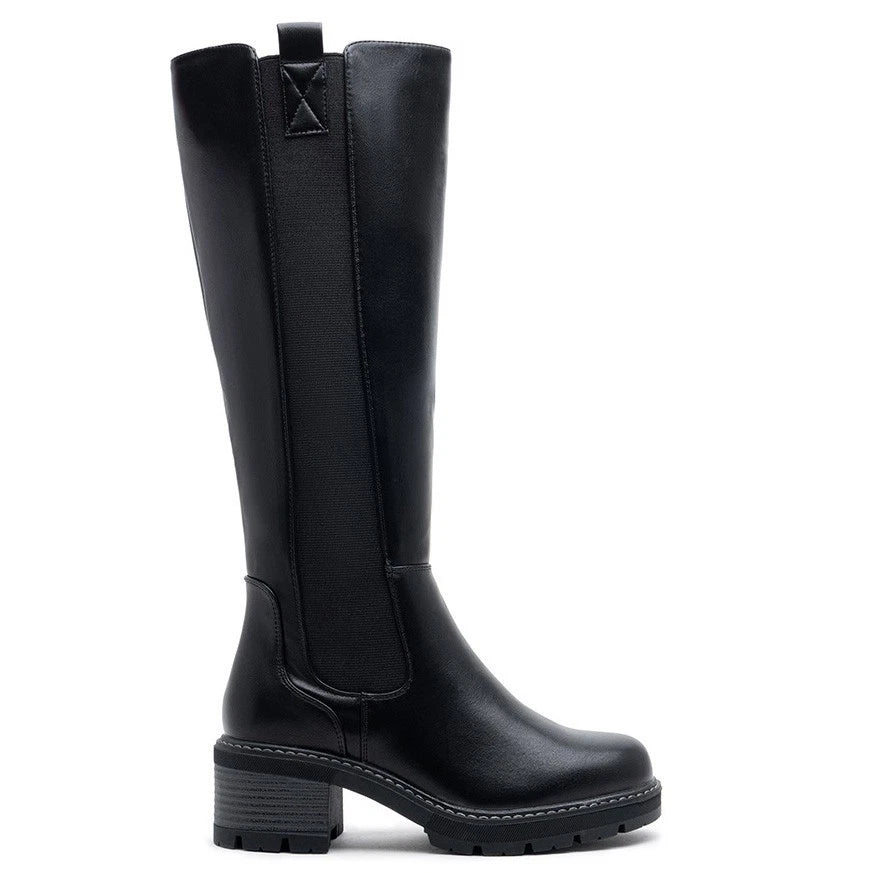 Black knee high boots, side view on a plain background