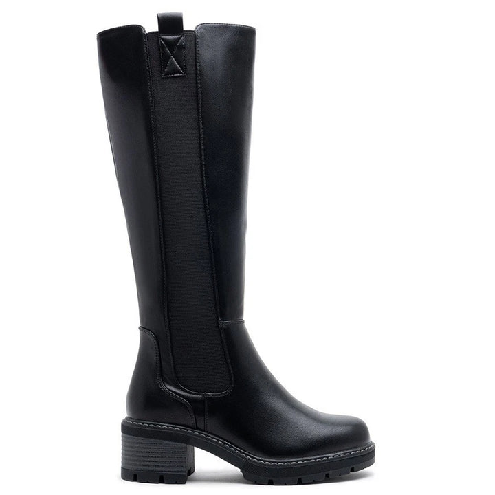 Black knee high boots, side view on a plain background