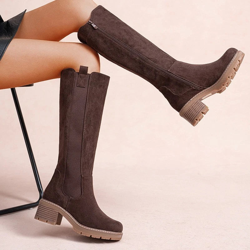 Dark Brown knee high boots, worn on foot, front view
