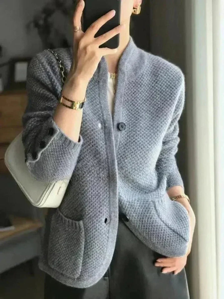Women's knitted cardigan in blue, button front stand collar pocket