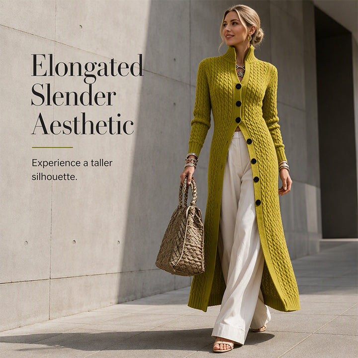 Olive green cable knit longline cardigan worn with cream wide leg trousers