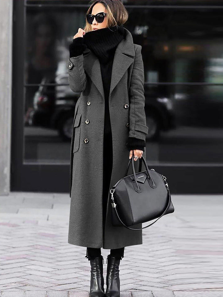 Charcoal long double breasted coat styled with a black scarf