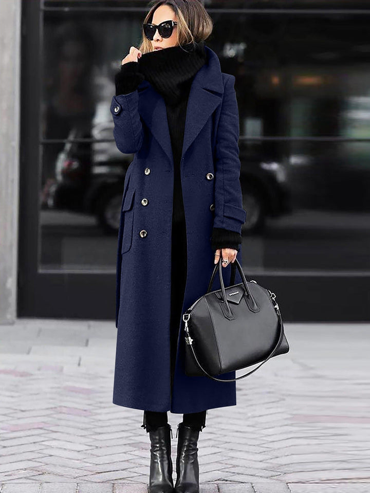 Navy long coat with double breasted buttons, street view