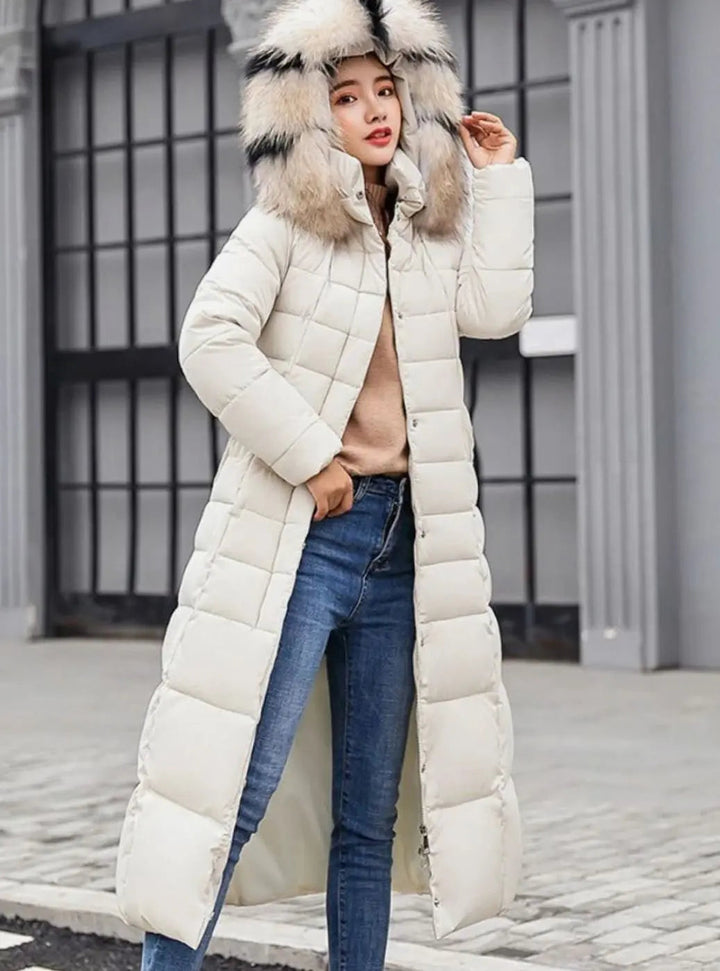 Off white long puffer coat with the faux fur hood up