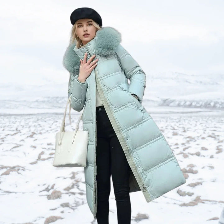 Women's long puffer coat in blue, faux fur hood belted quilted