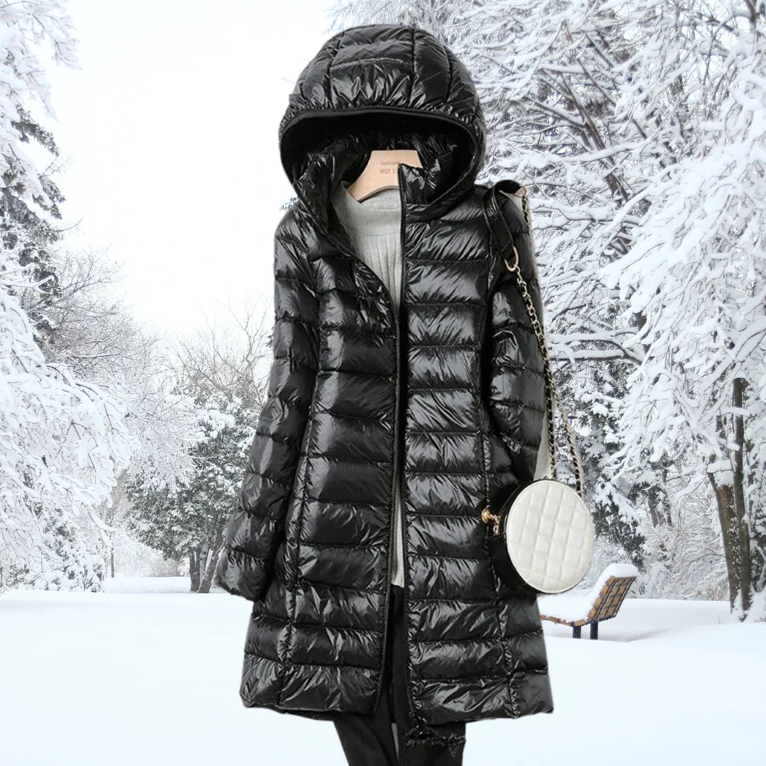 Women's long puffer coat in black, hooded lightweight quilted