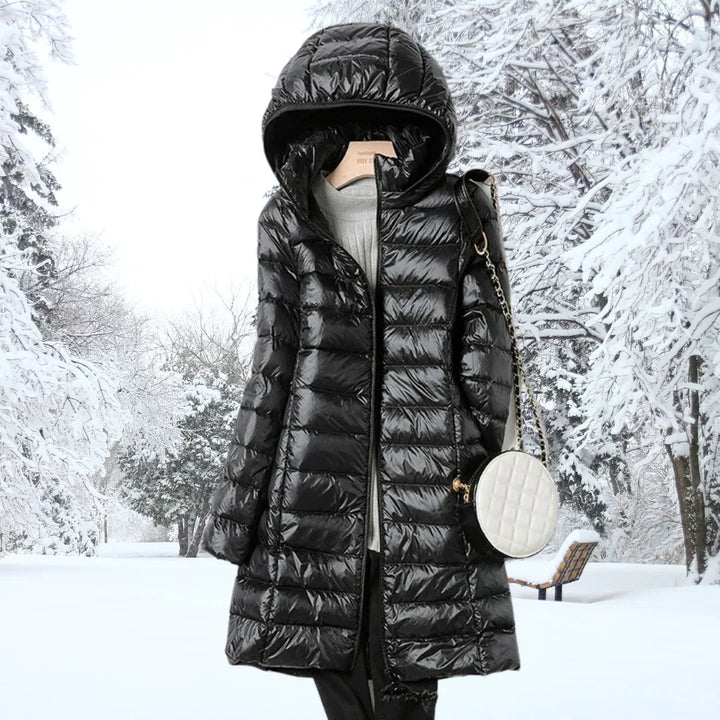 Women's long puffer coat in black, hooded lightweight quilted