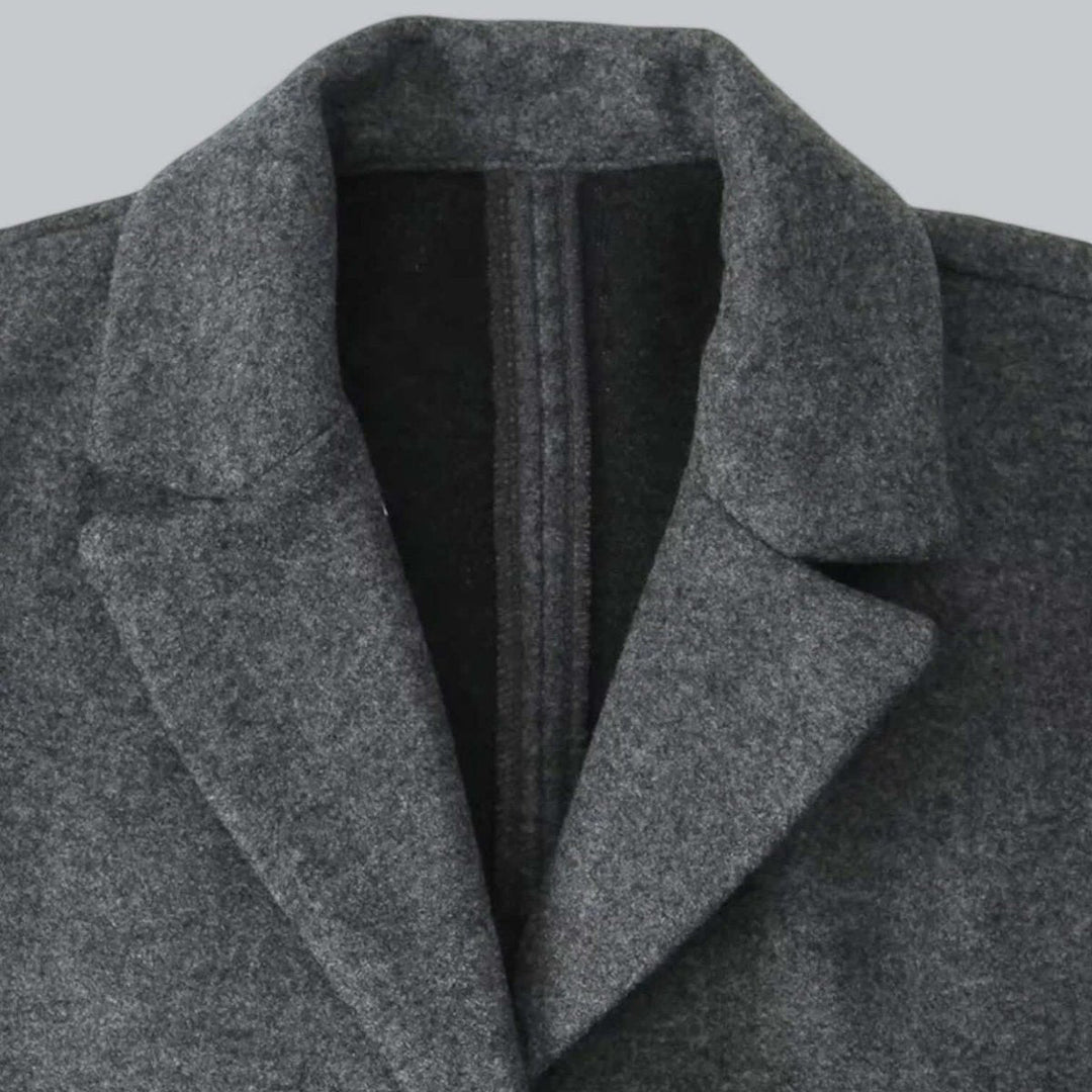 Charcoal grey coat lapel in close up