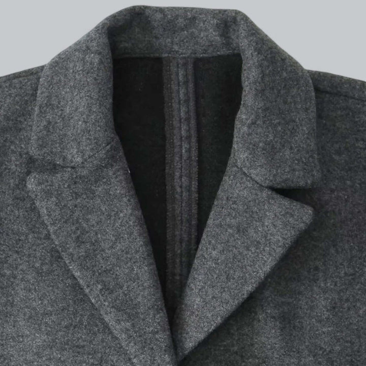 Charcoal grey coat lapel in close up