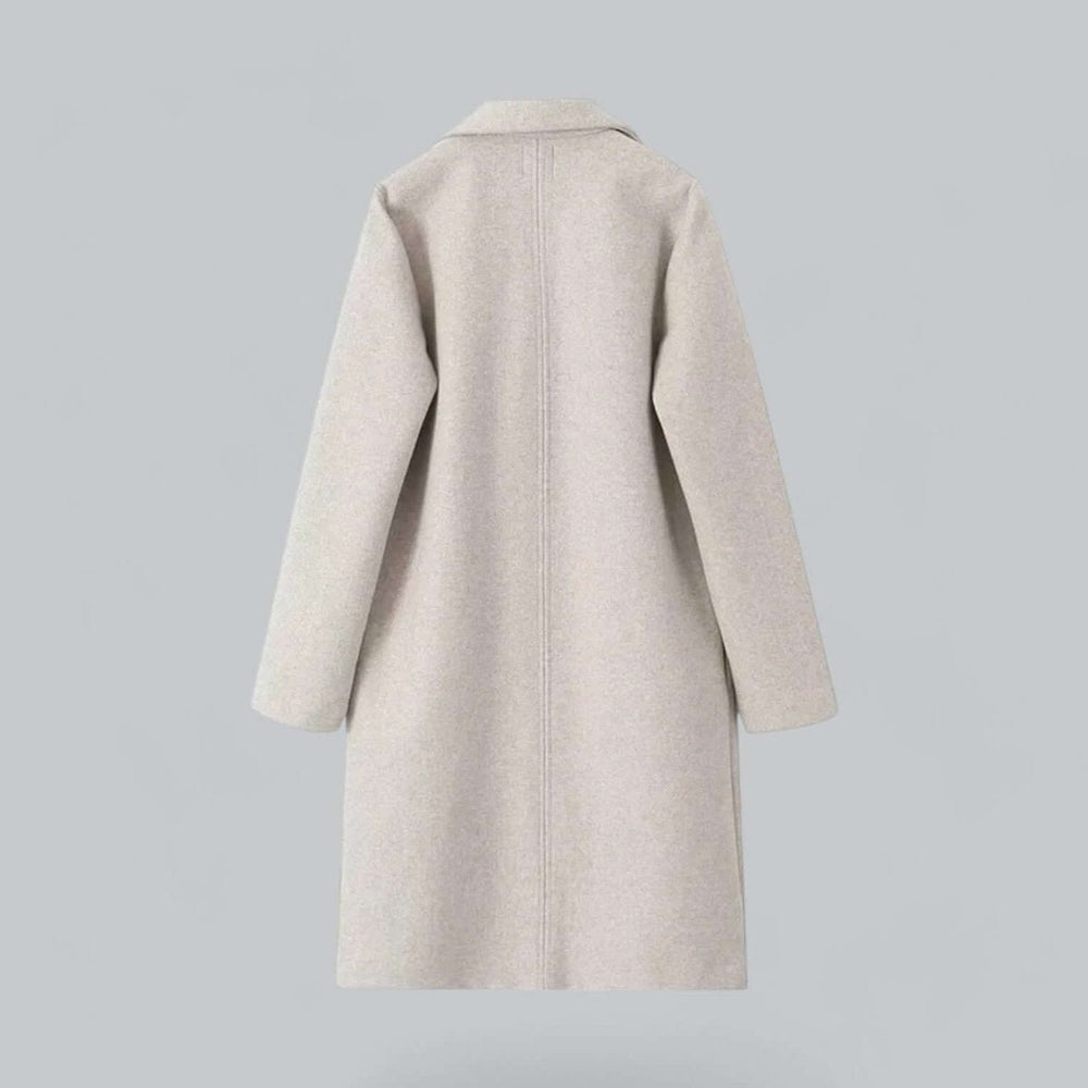 Back view of the oatmeal longline coat with a centre back seam