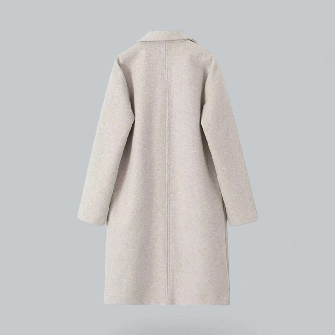 Back view of the oatmeal longline coat with a centre back seam