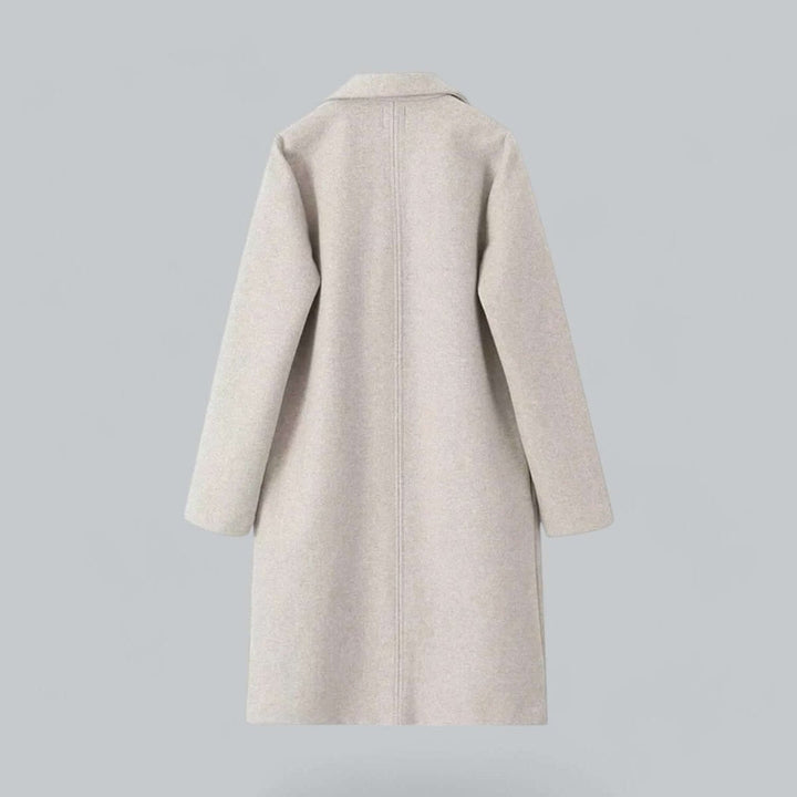 Back view of the oatmeal longline coat with a centre back seam