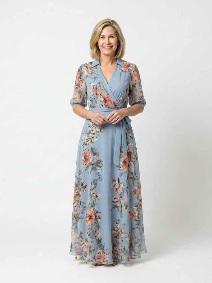 Women's maxi dress in pale blue floral with collared wrap front and tie waist