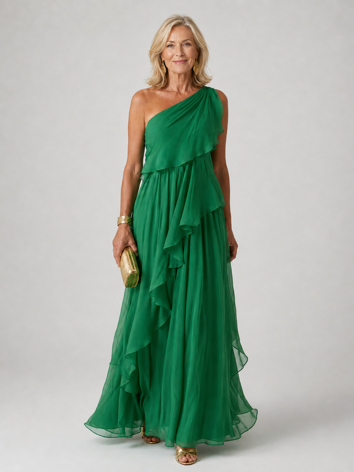 Women's maxi dress in green with one-shoulder neckline and cascading ruffle