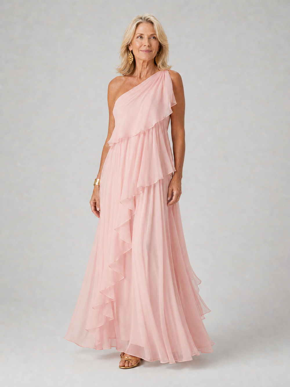 Pale pink one-shoulder dress with layered floaty skirt, front view