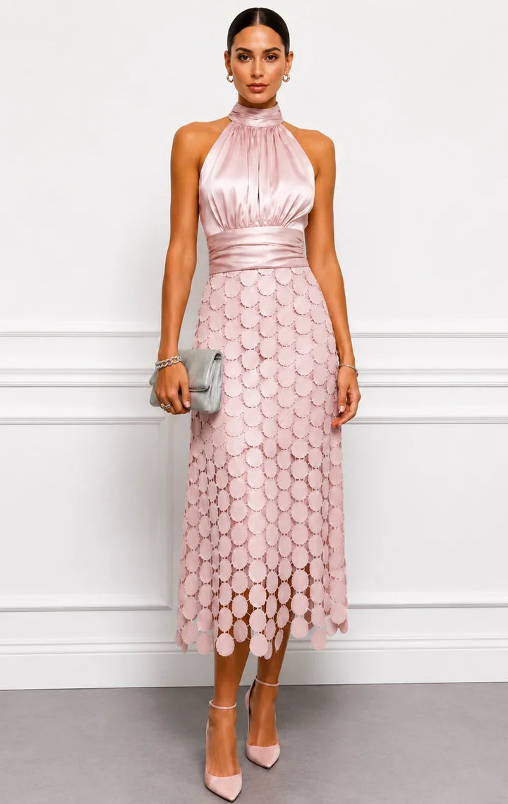 Pink halter dress with wide waistband and scalloped disc hem