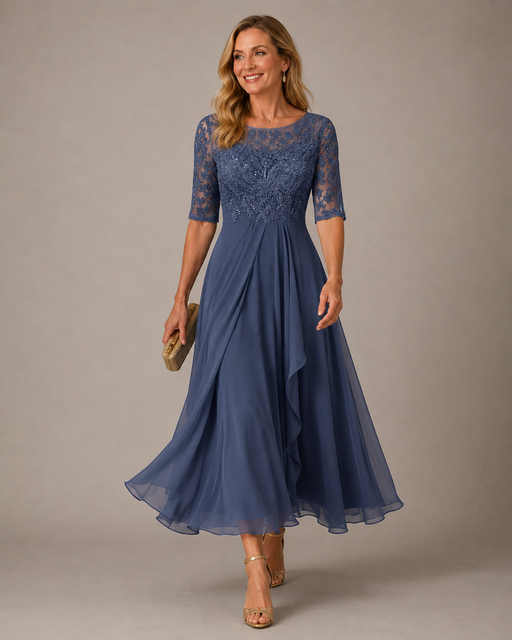 Women's midi dress in blue with lace bodice, half sleeves and draped flowing skirt