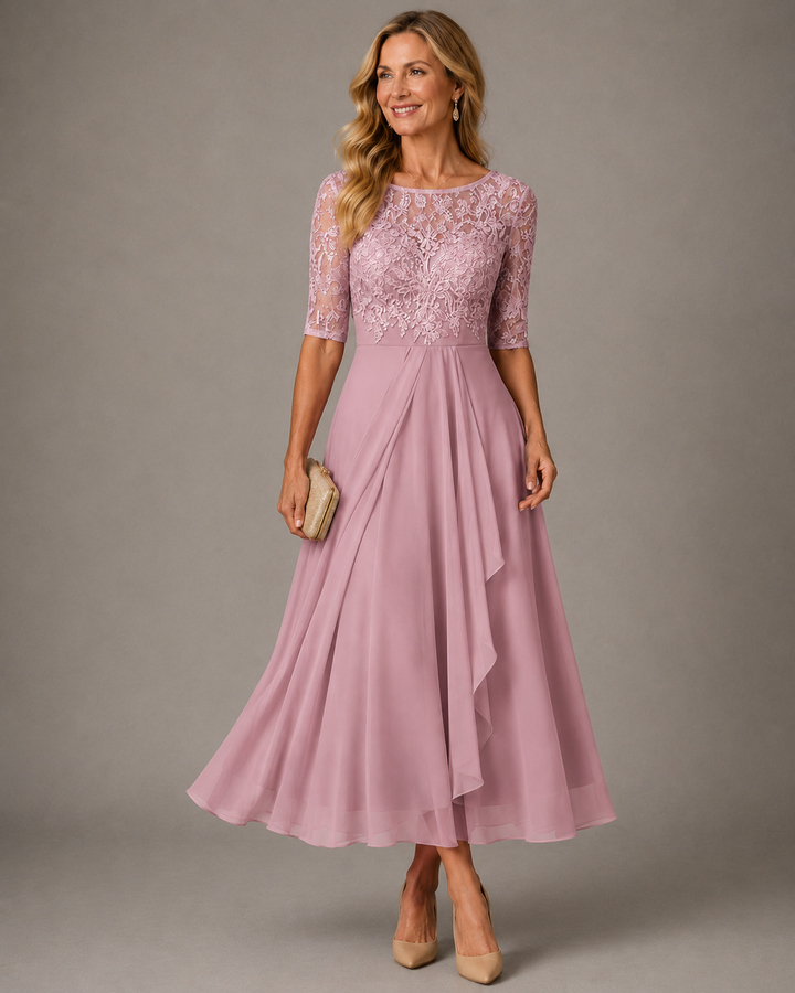 Pink dress with lace top and cascading layered skirt, front view