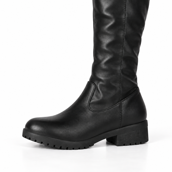 Side view of the black boot showing the low block heel