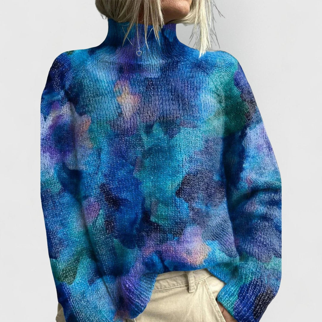 Deep blue watercolour print jumper with raised funnel neck and ribbed cuffs