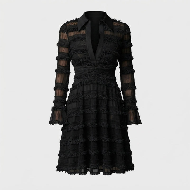 Black fringe midi dress laid flat with collar and long sleeves