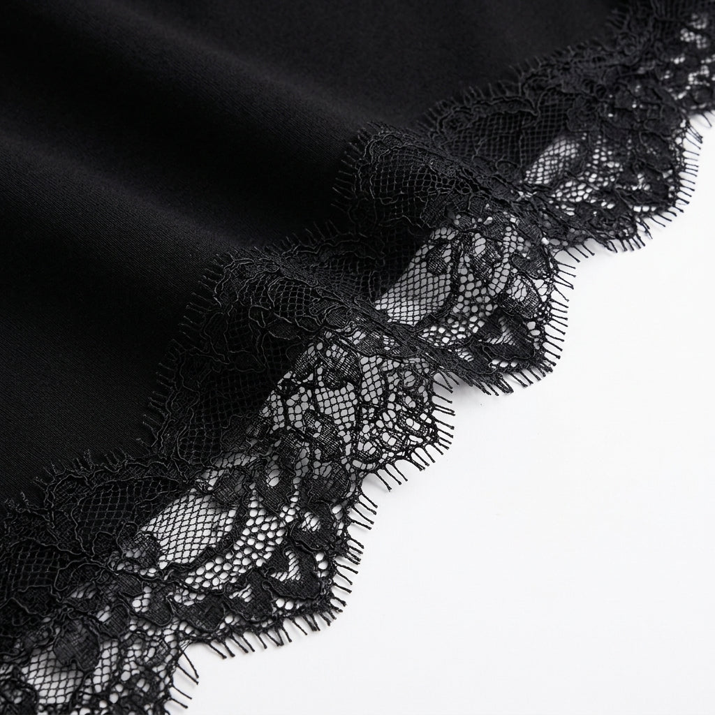 Detail of the black eyelash lace trim at the hem