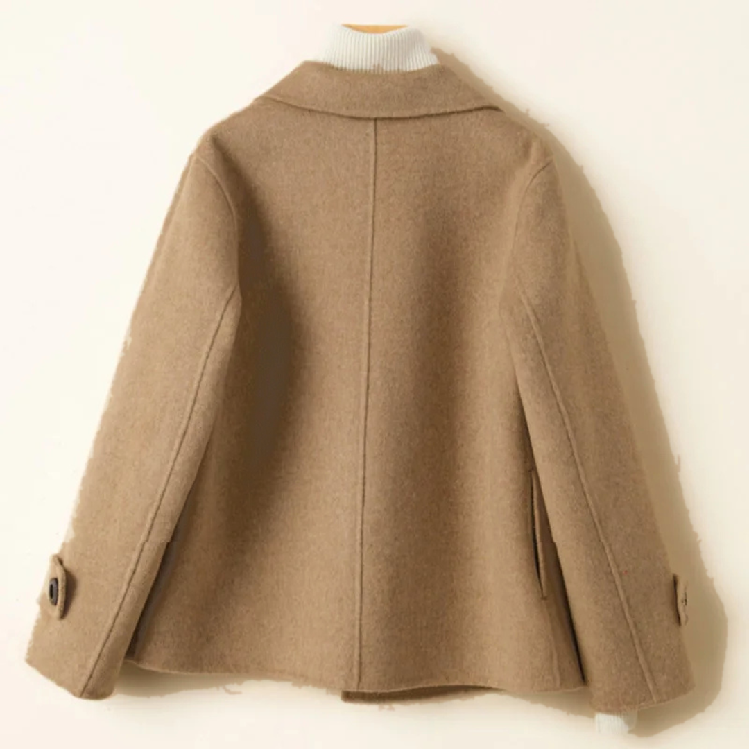 Back view of the camel pea coat with a centre back seam