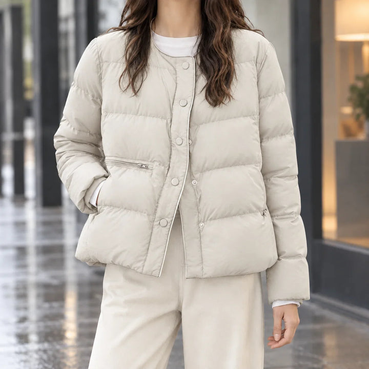 Women's puffer jacket in beige, collarless snap button short