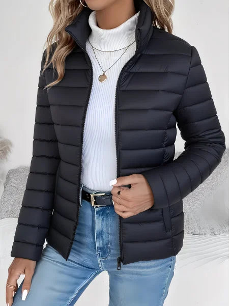 Women's puffer jacket in black, lightweight stand collar quilted