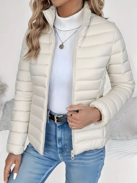Women's puffer jacket in cream, lightweight stand collar quilted