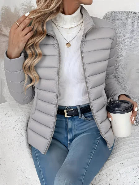 Women's puffer jacket in grey, lightweight stand collar quilted