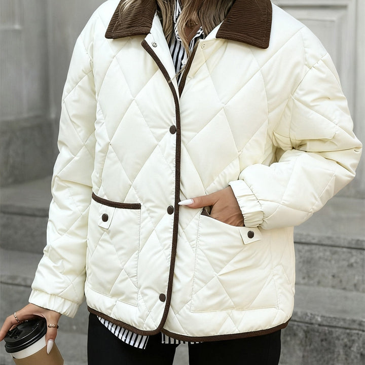 Cream diamond quilted jacket with brown corduroy collar and piping