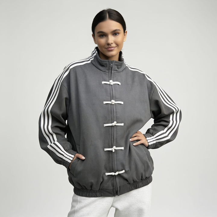 Charcoal grey track jacket with white sleeve stripes, front view