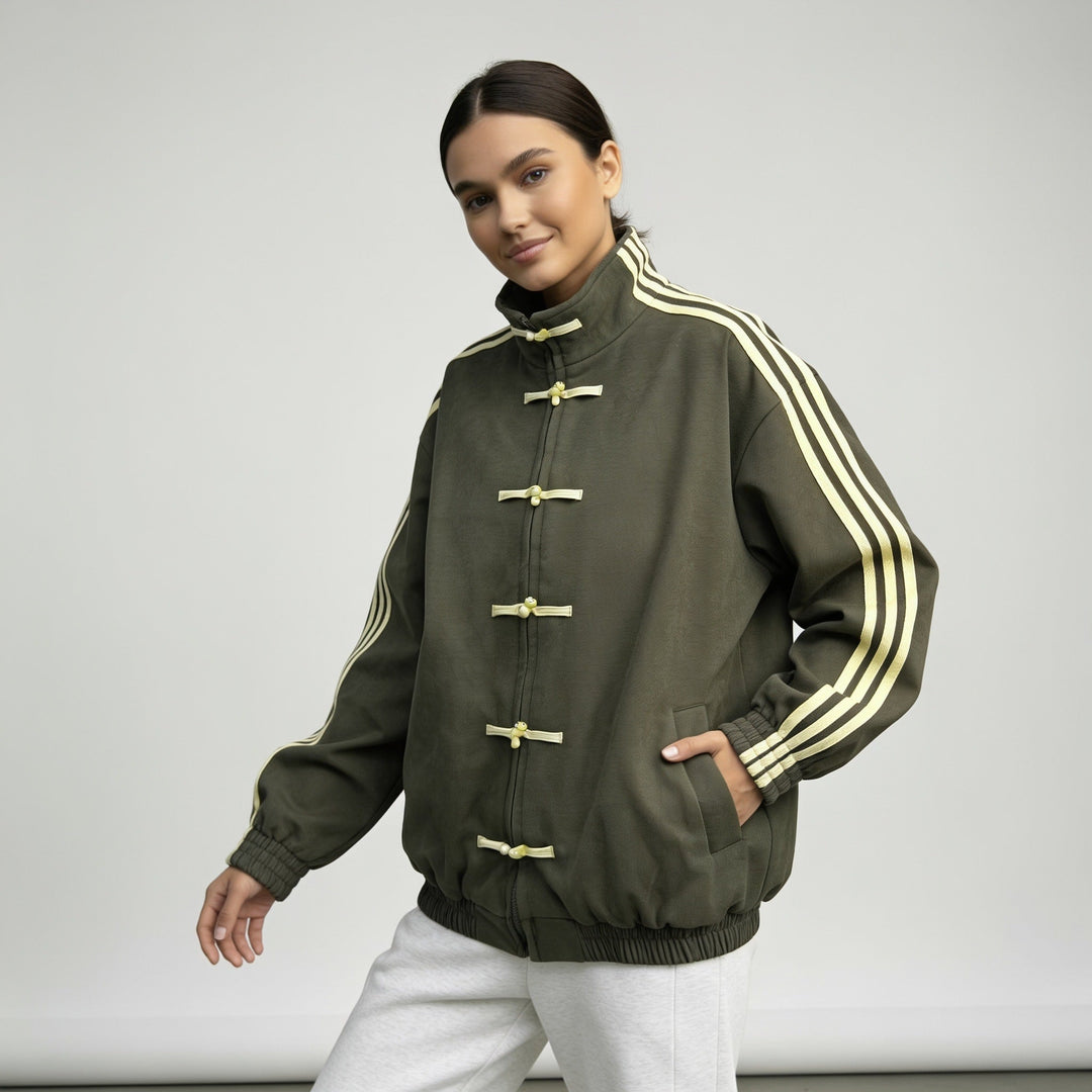 Olive green track jacket with pale yellow stripes and toggles