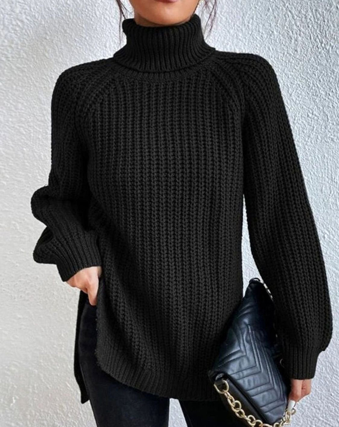 Black chunky roll neck jumper with side split hem