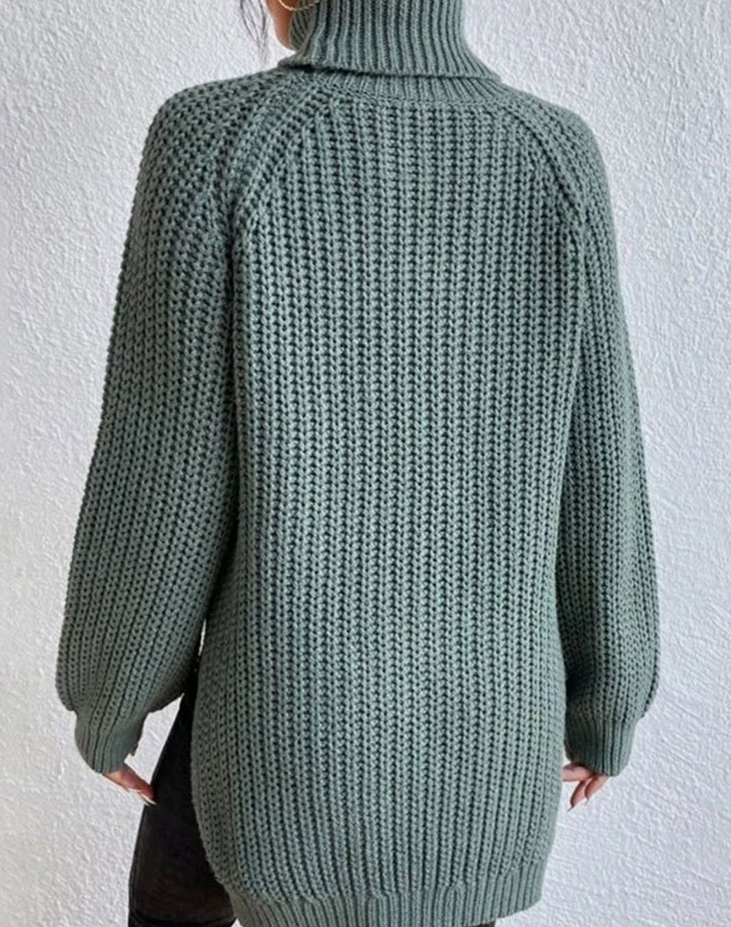 Back view of the sage green chunky jumper