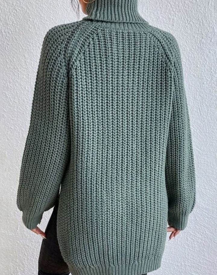 Back view of the sage green chunky jumper