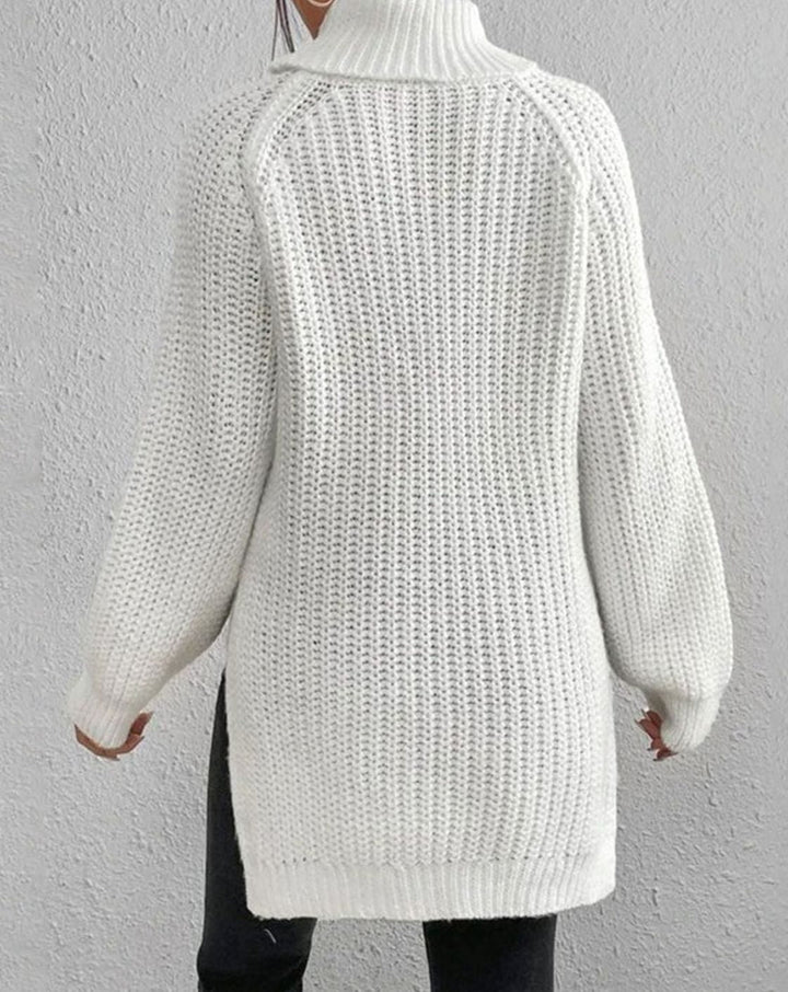 Back view of the white roll neck jumper with raglan seams