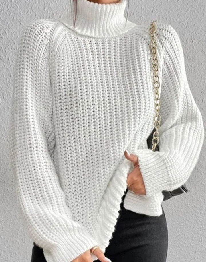 Women's roll neck jumper in white, chunky ribbed with balloon sleeves