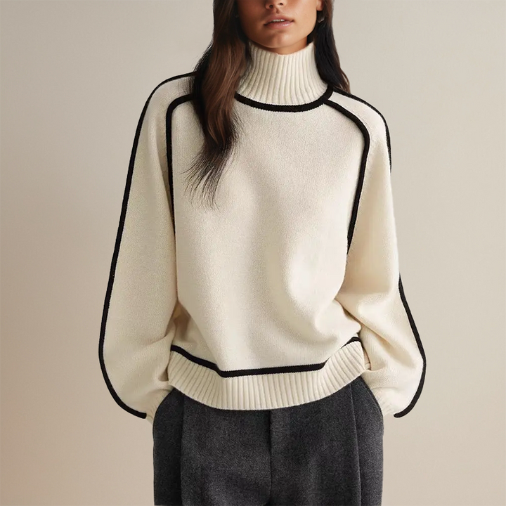Cream roll neck jumper with black piping on the seams and hem
