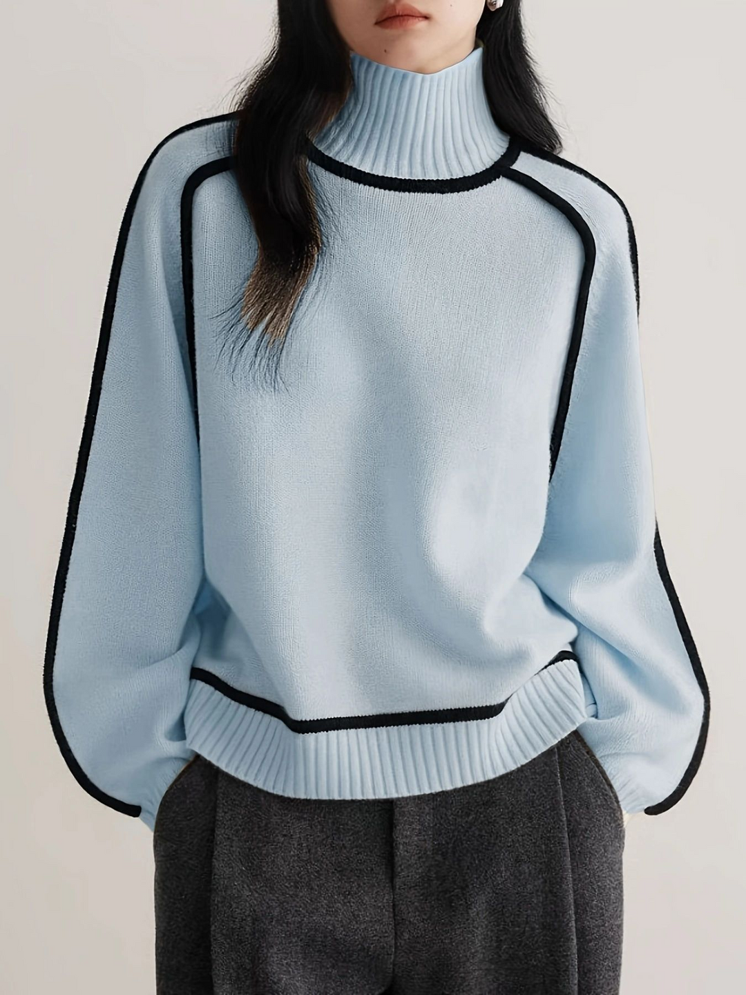Light blue turtleneck jumper with black contrast piping