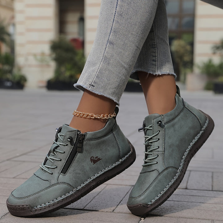 Women's ankle trainers in green, lace up high top stitched