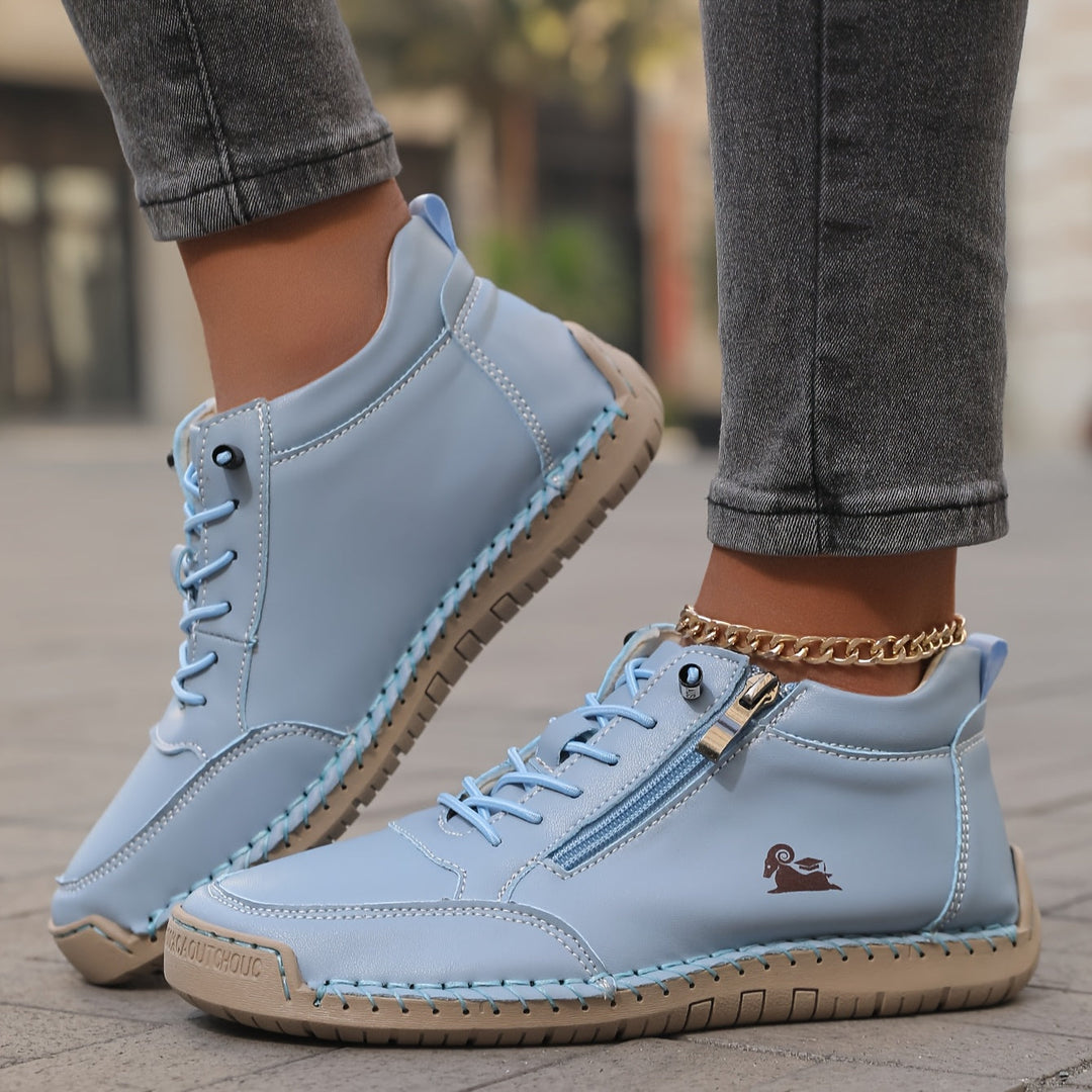 Women's ankle trainers in light blue, lace up high top stitched