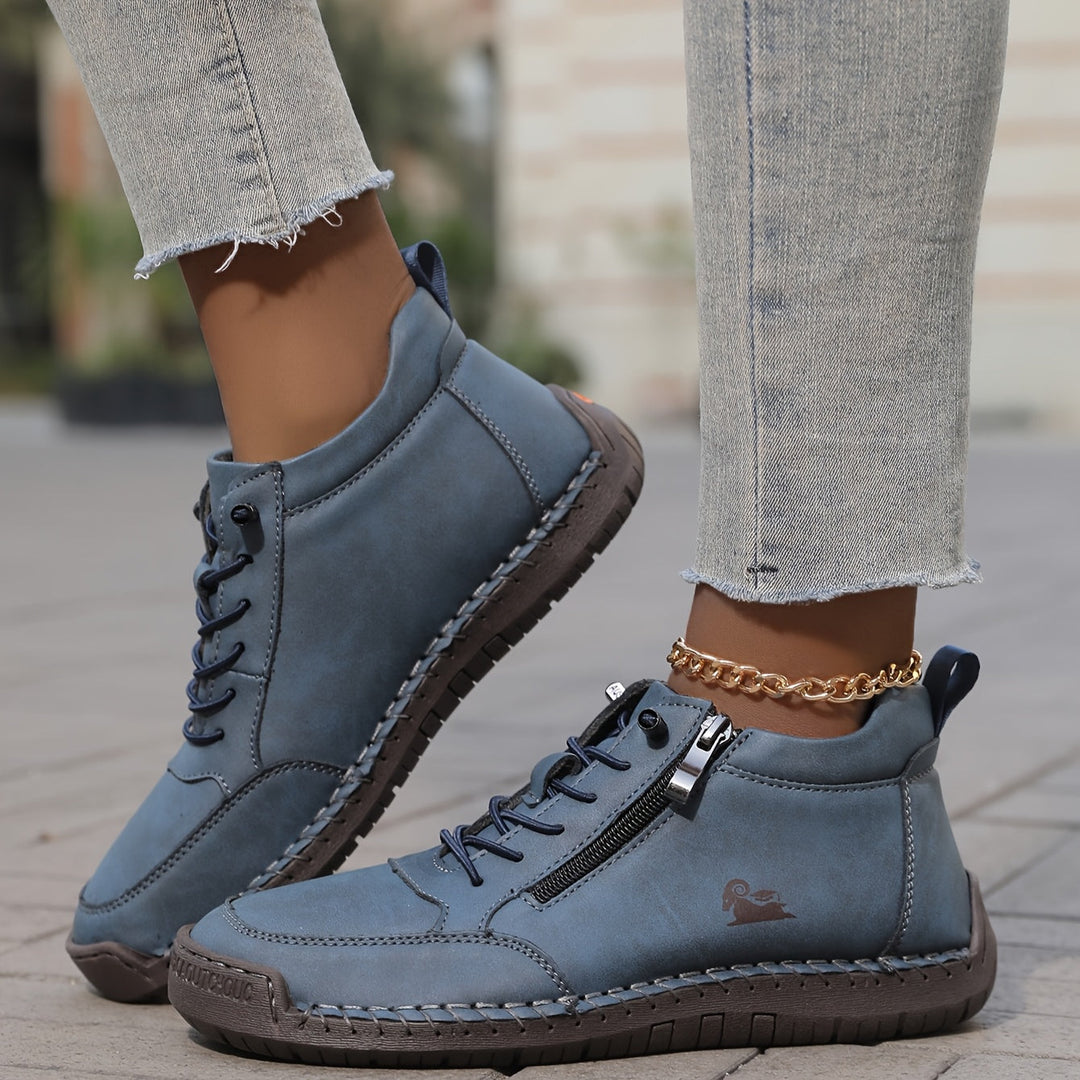 Women's ankle trainers in navy, lace up high top stitched