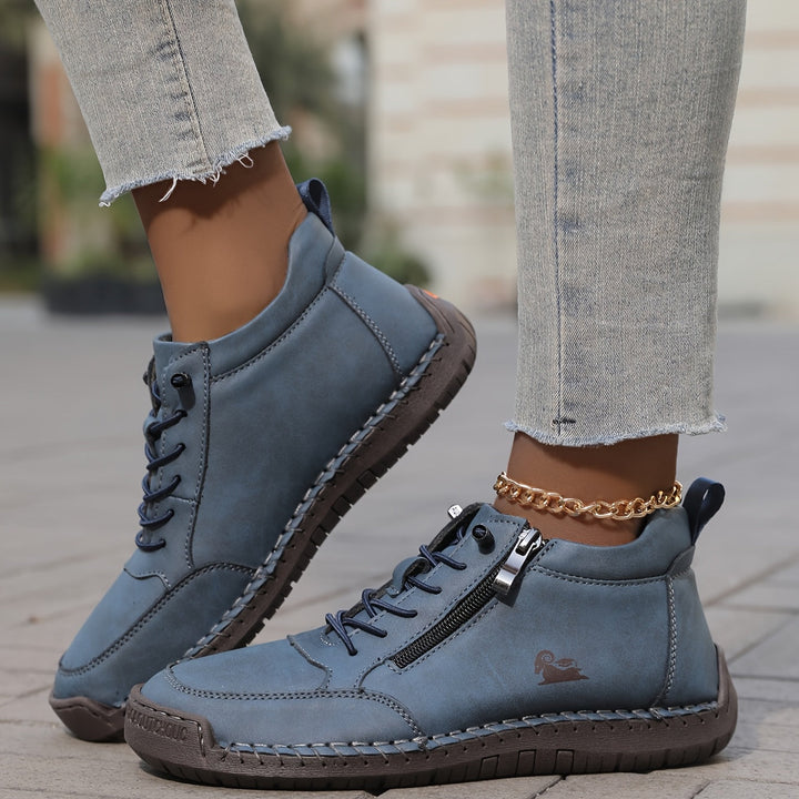 Women's ankle trainers in navy, lace up high top stitched